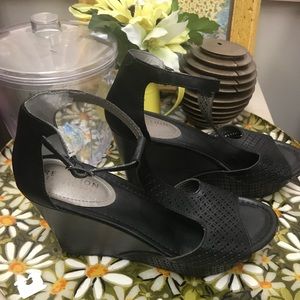 Black Kenneth Cole Reaction wedge heels.